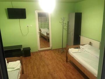 Фото номера Двухместный номер с 2 отдельными кроватями Проживание в семье Casa albastră г. Маргита 30